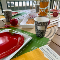 This set of 12 placemats features a word search and cursive practice section, cleverly designed to resemble a chalkboard. It’s the perfect way to mix fun and function, making your table setting both entertaining and educational.