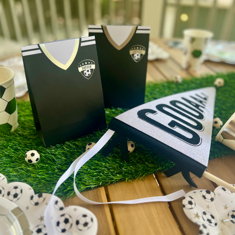 Score a goal with your party favors using these soccer treat bags! Ideal for any soccer birthday bash or team event, these bags are sure to be a crowd-pleaser.