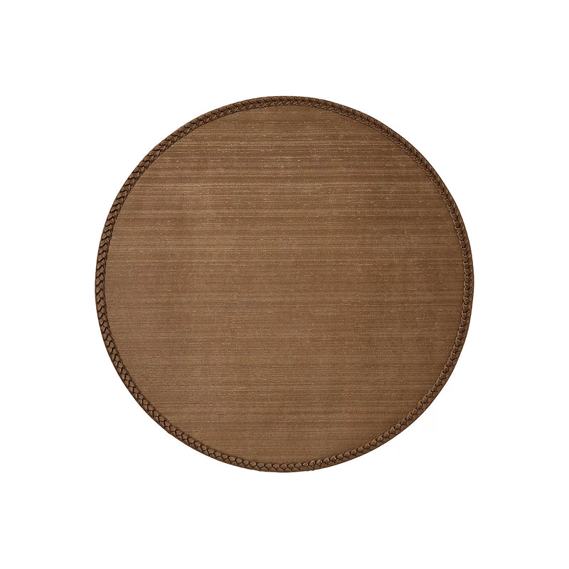 Discover the secret to an effortlessly elegant table setting with our taupe Lexington Placemats. These round vinyl wonders not only add a stylish touch to any meal but also promise a quick cleanup with their wipeable surface. Perfect as a Mother's Day gift, they're a chic, practical choice for the discerning hostess.