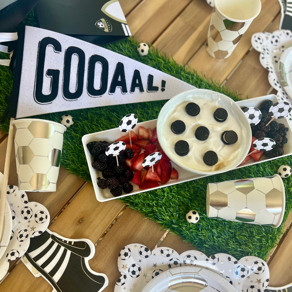 Kick off the fun with our soccer paper cups! These 12 oz cups, featuring a stylish white and silver soccer ball design, are the ultimate companions for your soccer birthday party.