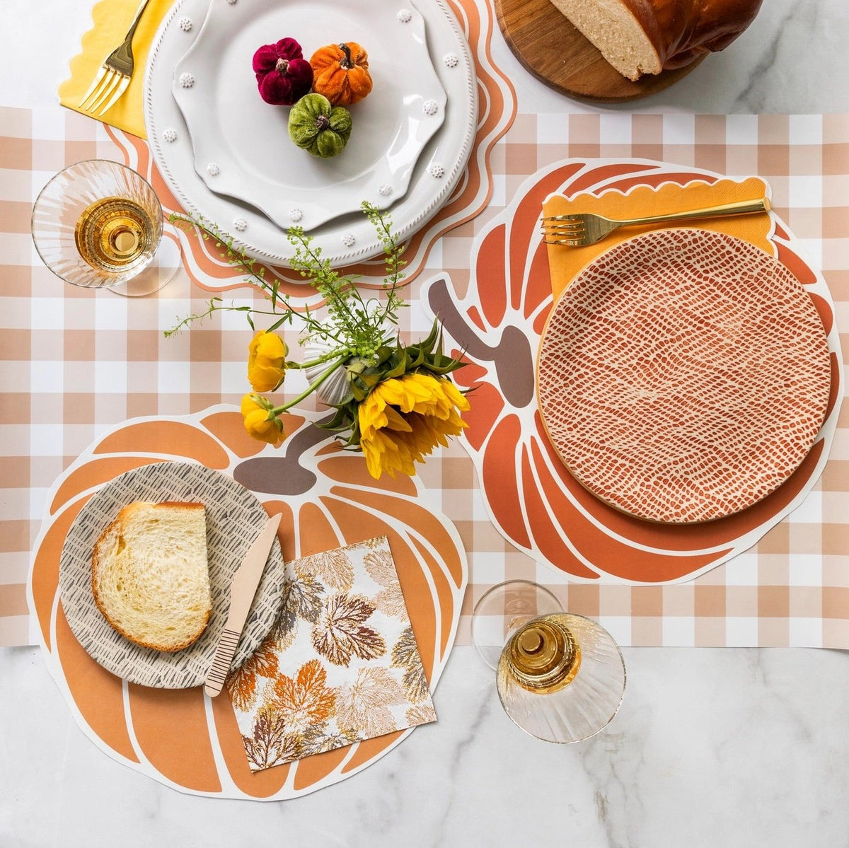 Square Thanksgiving Napkin with a leaf design on a fall place setting