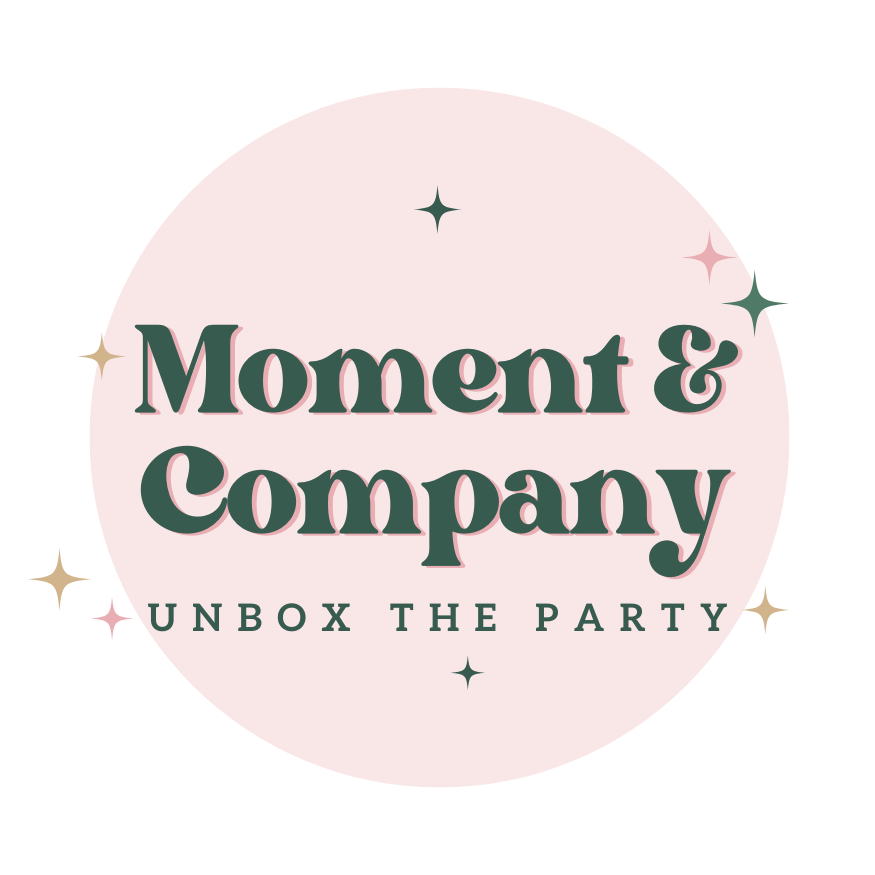  Moment & Company logo with the tagline "Unbox the Party," representing their fall cocktail napkins and festive Thanksgiving tableware collection.