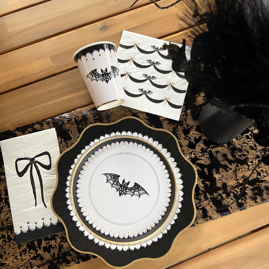 A black glam halloween party kit with bats and lace