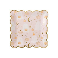 Pink Halloween-themed square paper plates with scalloped edges, featuring whimsical ghost and pumpkin designs—ideal for stylish Halloween party decor.