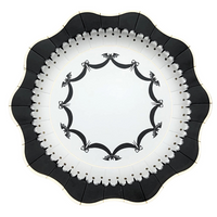 a large paper dinner plate with black and gold designs featuring bats and bows perfect for halloween.