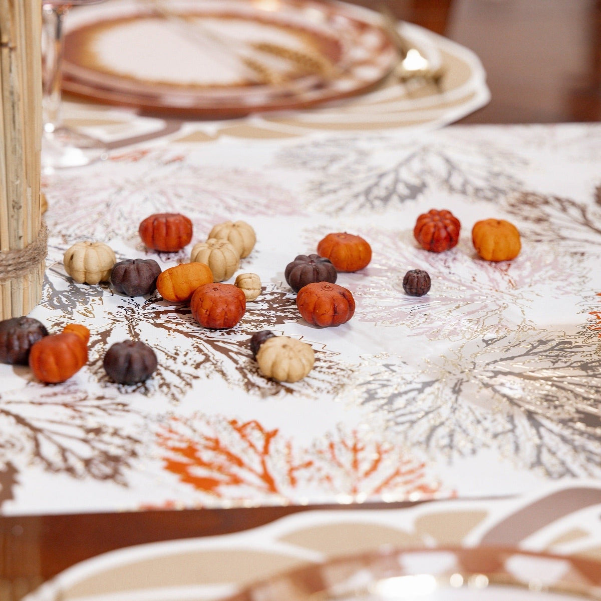 Paper table runner with leaf design