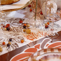 Paper table runner with leaf design