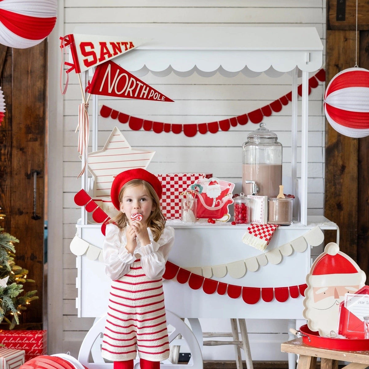 Here comes santa felt pennant on a hot cocoa stand 