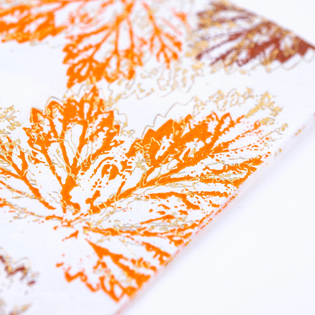 detail shot of Square Thanksgiving Napkin with a leaf design.