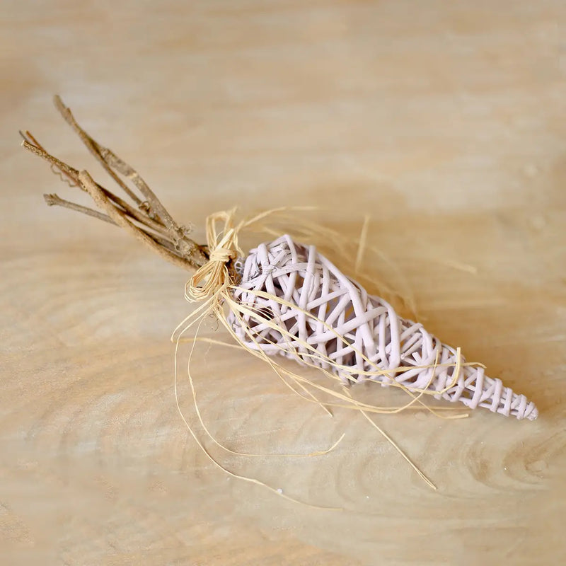 Light pink Easter Carrot Decoration with a rustic straw bow
