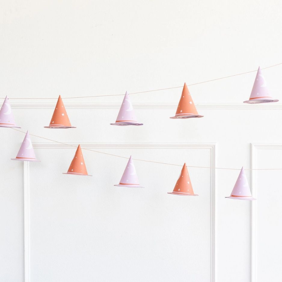 Halloween garland with pink and gold witch hats, ideal for Hocus Pocus decor and pink Halloween decor.