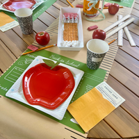 This set of 8 square plates, designed to look like notebook paper, is perfect for a school-themed celebration.