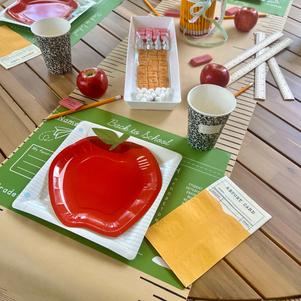 This set of 12 placemats features a word search and cursive practice section, cleverly designed to resemble a chalkboard. It’s the perfect way to mix fun and function, making your table setting both entertaining and educational.