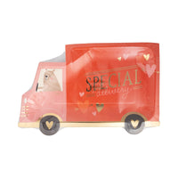 Close-up of delivery truck-shaped Valentine plate showcasing its red and white truck design with heart accents.