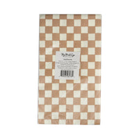 Tan and white checkered paper dinner napkins in their packaging