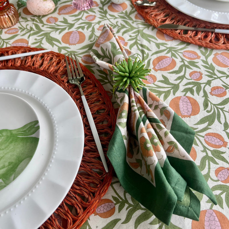 floral cloth napkin in green and orange pomegranate design - perfect for a spring table or an Easter tablescape. These are lovely spring Napkins.
