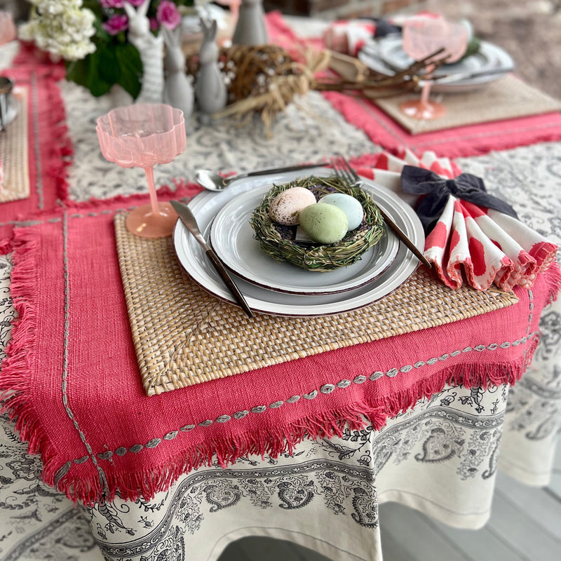 Pink rectangle placemats with fringe and stitching details - perfect for a Spring table.