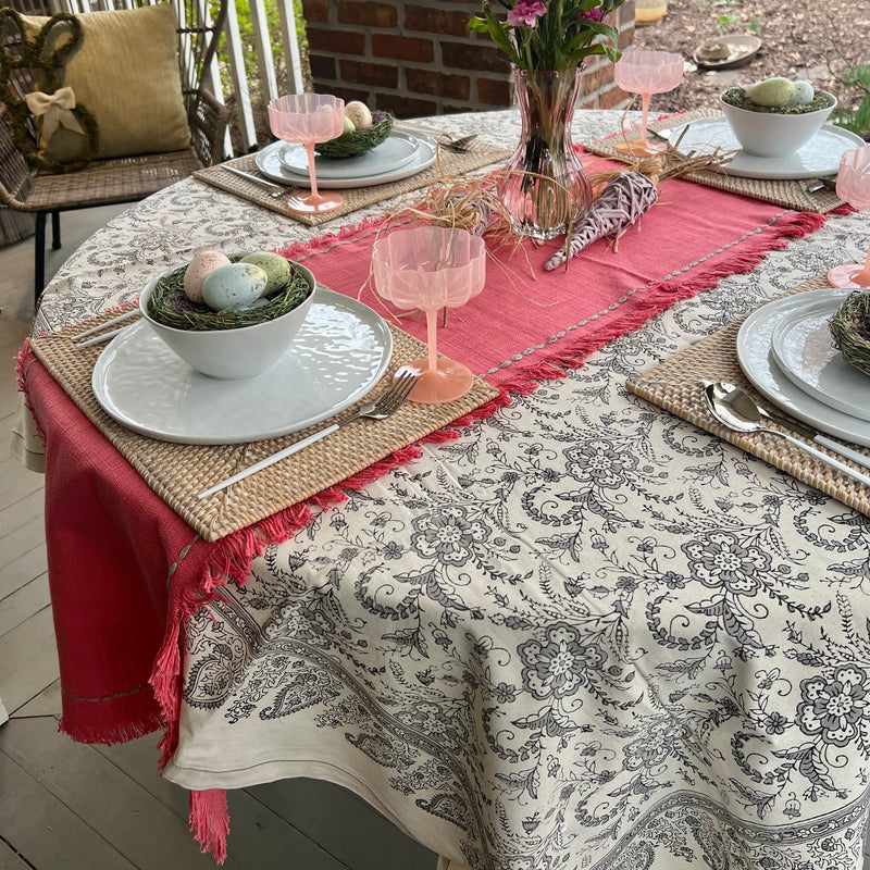 Pink table runner with fringe and stitching details - perfect for a Spring, Mother's Day or Easter table.