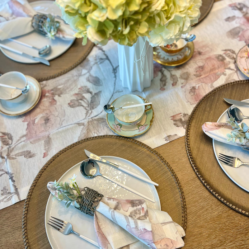 Hosting has never been easier with our Magnolia Tablescape Kit. Complete with everything you need for a perfect Spring tablescape or Mother’s day brunch—including vinyl placemats, a floral runner, matching napkins, and decorative napkin rings—this kit takes the hassle out of table setting. Unbox, set up, and celebrate in style with our comprehensive table decor kit.