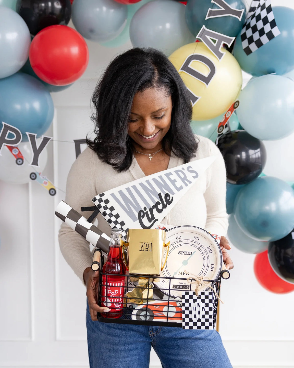 Miles Per Hour Winners Circle Felt Pennant alongside other car-themed decorations at a Two Fast Birthday celebration.