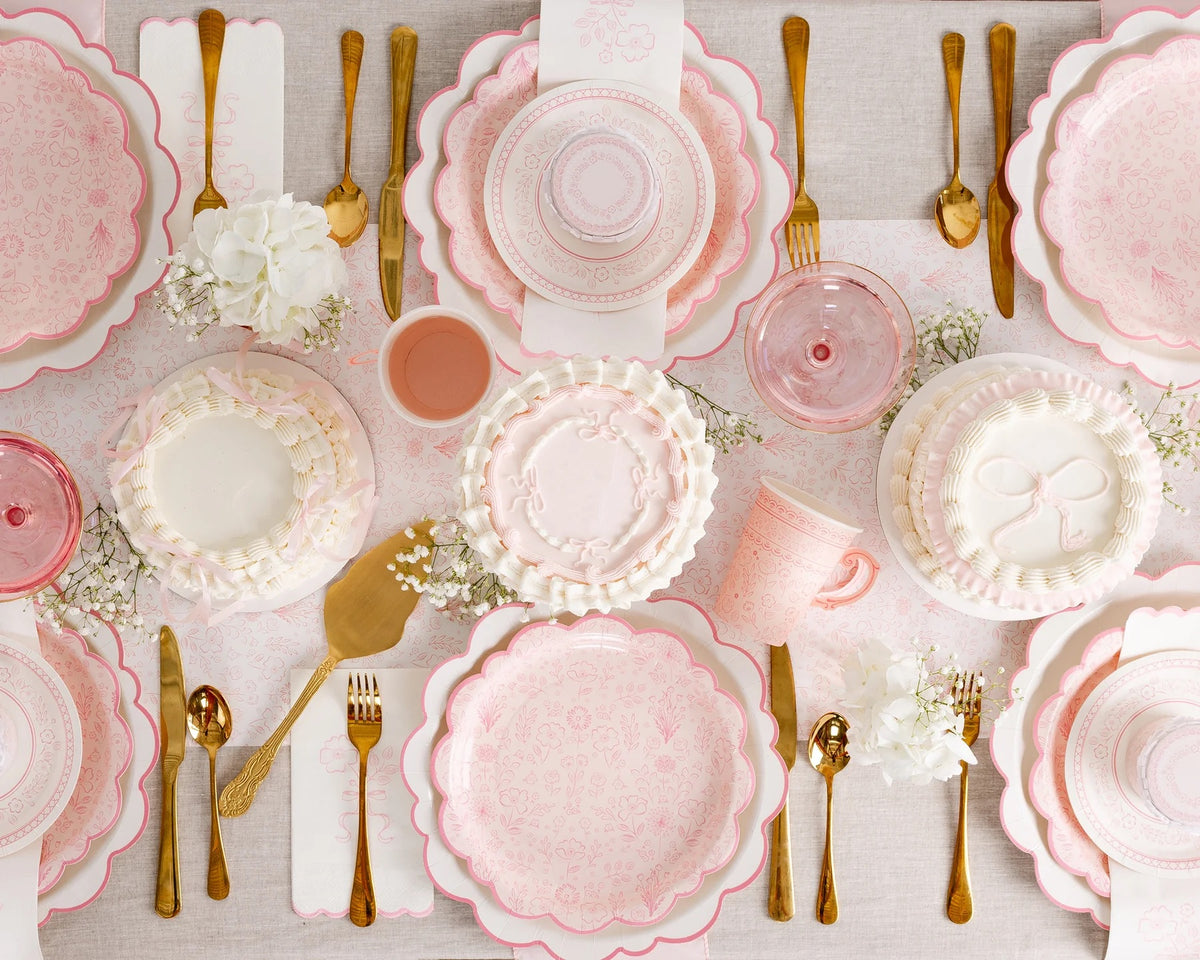 Pink Floral Party Cups arranged on a beautifully decorated table for a stylish celebration.