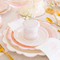 Stack of Pembroke Paper Dinner Napkins arranged alongside cupcakes at a baby shower.