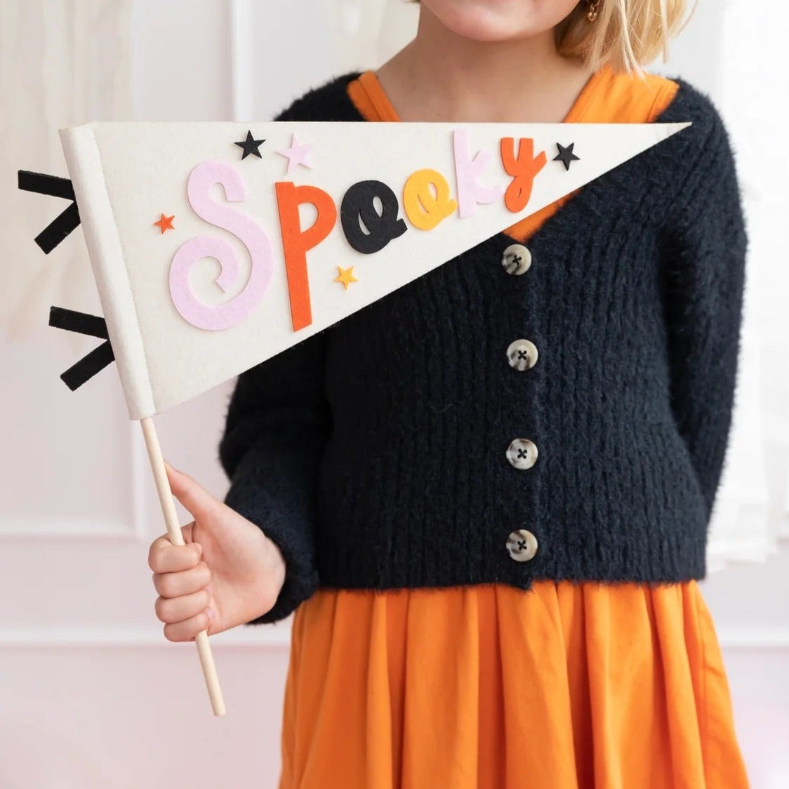 Halloween flag with Spooky text on a 15-inch felt pennant, attached to a 14-inch wood dowel for Halloween centerpieces.