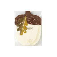 A set of acorn-shaped napkins featuring a brown acorn top and a golden leaf detail, perfect for adding a rustic touch to your Thanksgiving decor. These acorn napkins are ideal for a festive harvest party.