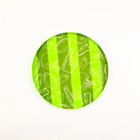 Green striped football paper plate with a white football-themed motif, perfect for decorations for a tailgate party or football-themed gatherings.