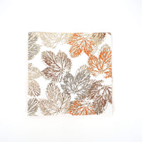 Square Thanksgiving Napkin with a leaf design.