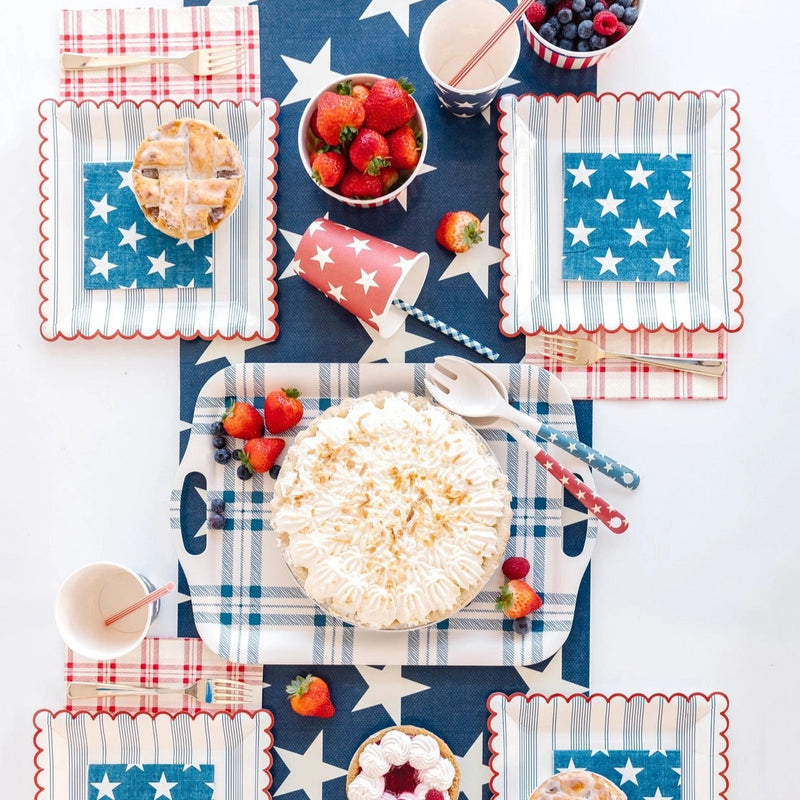 Blue paper cocktail napkins with white stars - perfect for a 4th of July party or Memorial Day Party.