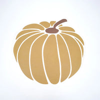 Detail shot of the tan Pumpkin paper placemat.