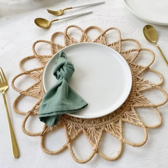 Rattan placemat with a boho design.