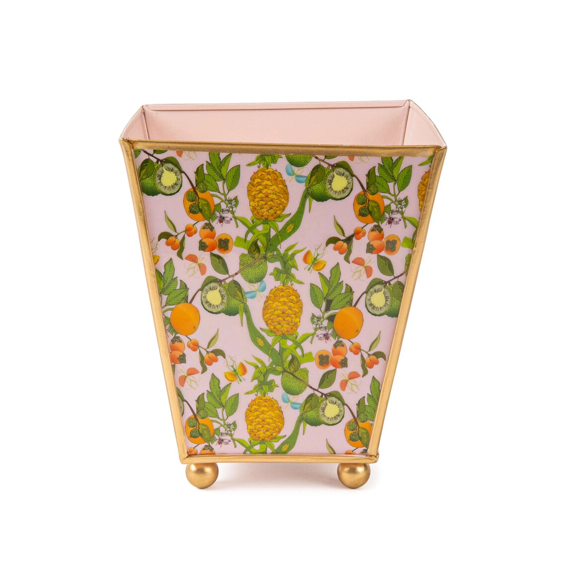 Make a statement with our Enameled Square Cachepot Planter, a playful yet practical table centerpiece. Decked out in a vibrant palette and a fruity motif of pineapples, limes, and oranges, this cachepot is trimmed in gold for that extra sparkle. Whether you're looking to brighten up your office desk, kitchen counter, or dining table, it offers a splash of spring and summer all year round. Versatile and visually stunning, it’s the centerpiece that brings your tablescape ideas to life.
