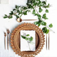 Discover the perfect addition to your table with our Floral Wicker Charger Plates. These 13.7" Spring Placemats are crafted from hand-woven rattan reeds, featuring a unique spiral braided design ideal for any Garden Party Decor. Elevate your dining experience with these versatile Rattan Placemats that effortlessly blend natural beauty with bohemian charm.