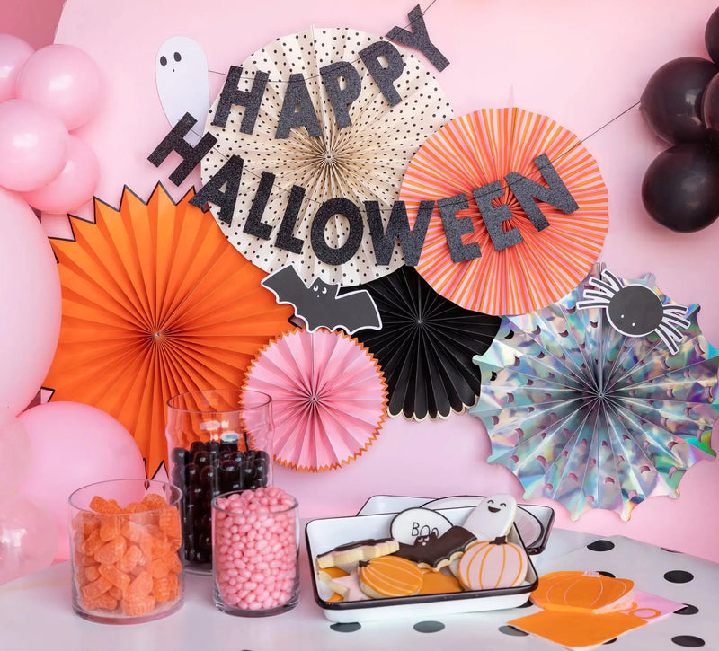 fun halloween party decorations in orange, black and pink
