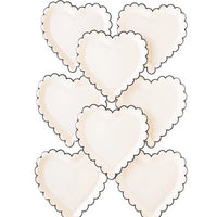 White heart-shaped paper plates with black scalloped edges - perfect for valentines day or an anniversary party