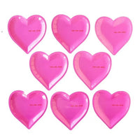 Pink heart shaped paper plates with the words you are here - perfect for a valentines day party or a bachelorette party