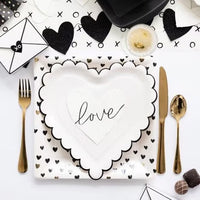 White heart-shaped paper plates with black scalloped edges - perfect for valentines day or an anniversary party