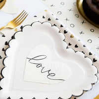 White heart-shaped paper plates with black scalloped edges - perfect for valentines day or an anniversary party