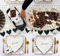 White heart-shaped paper plates with black scalloped edges - perfect for valentines day or an anniversary party