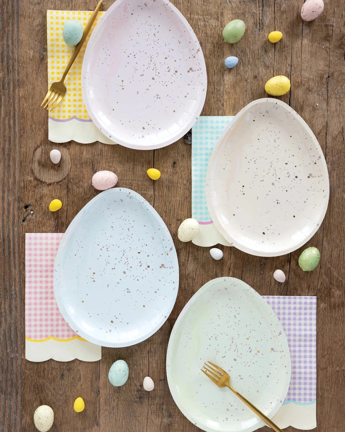 Easter plates shaped like eggs - pastel egg shaped plates perfect for an easter table and easter brunch.