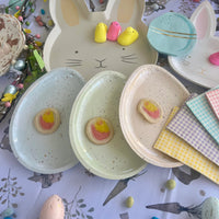 Easter plates shaped like eggs - pastel egg shaped plates perfect for an easter table and easter brunch.