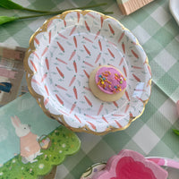 Paper Easter plates with scalloped edges and a carrot design - perfect for an Easter party or brunch